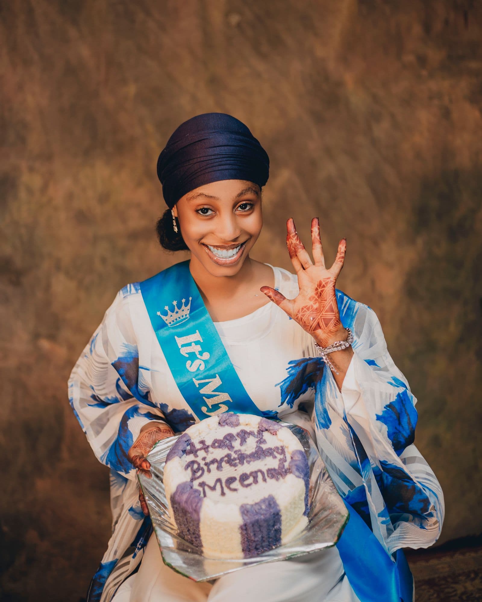 Woman celebrating her birthday with a cake